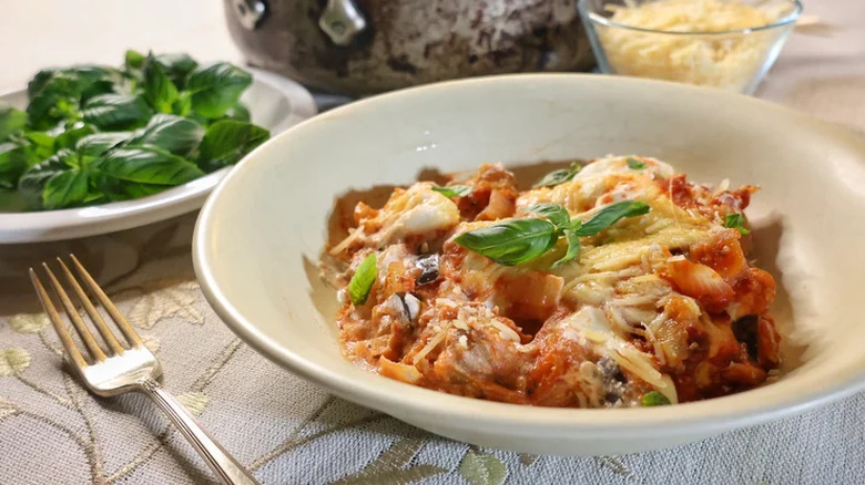 Gnocchi lasagna bake in a dish with herbs
