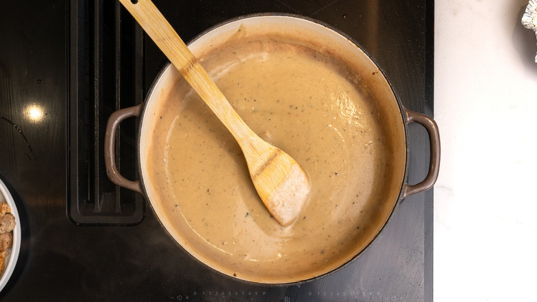 boursin and mushroom soup sauce in pan