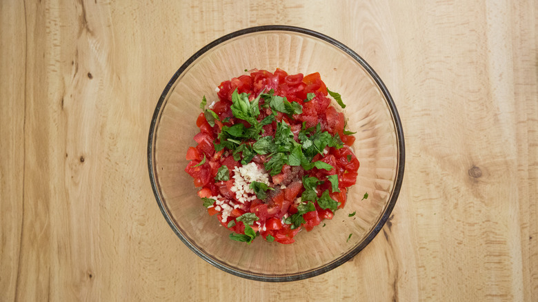 tomato salad in glass bowl