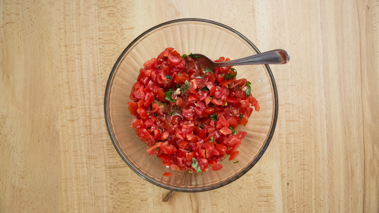 tomato salad in glass bowl