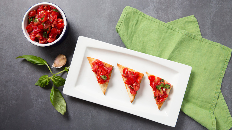 bruschetta served on gray table