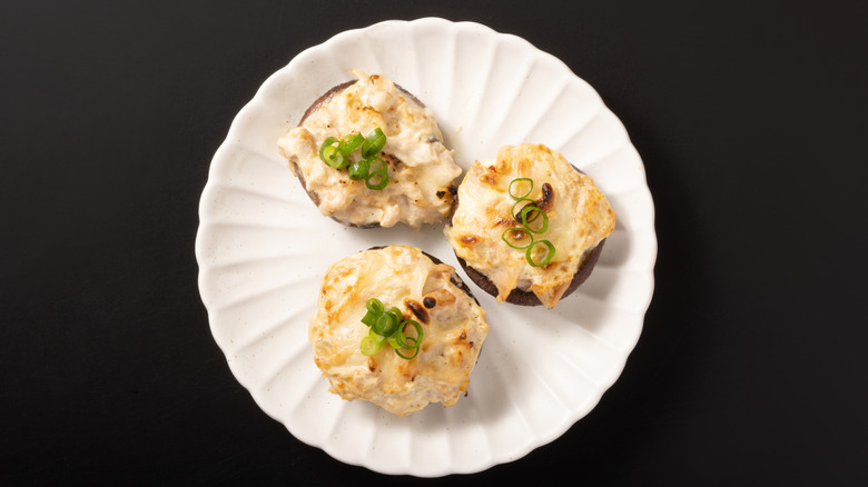 A plate of mayo stuffed mushrooms