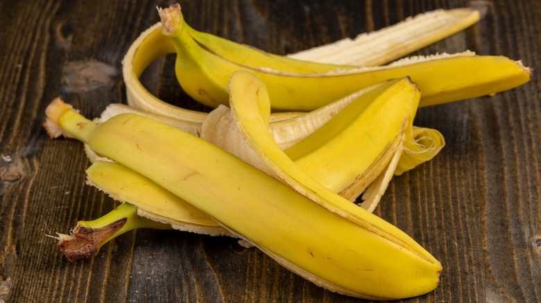 some banana peels on a wooden surface