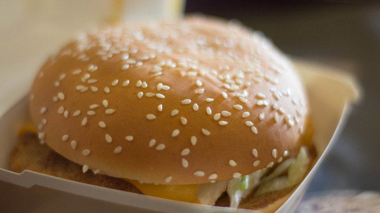 A close up of McChicken sandwich with sesame seed bun