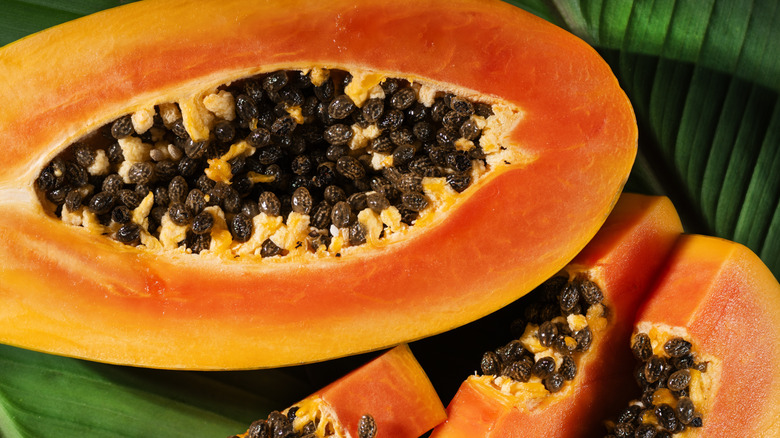 freshly cut papayas