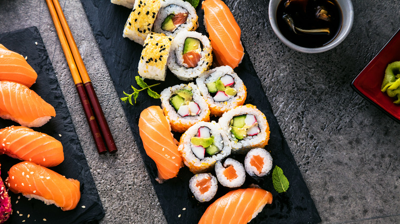 Maki and uramaki sushi on plate