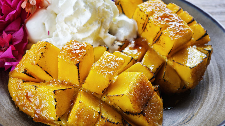 Grilled mango with butter and honey