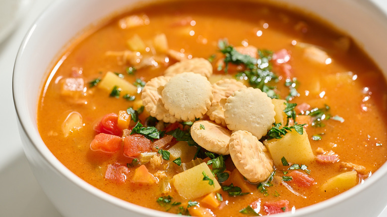 Bowl of manhattan clam chowder on a table