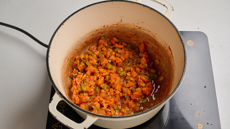 clam juice simmering in pot