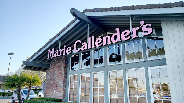Exterior view of a Marie Callender's restaurant, with big glass doors and windows