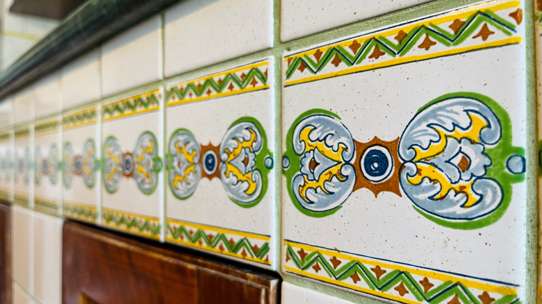 Patterned tiles on kitchen wall
