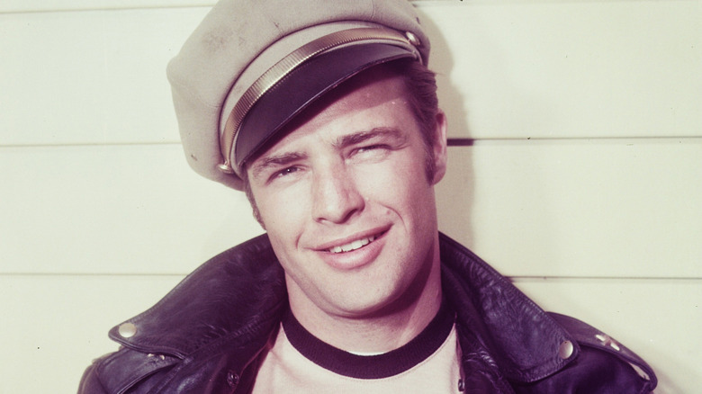 Marlon Brando wearing a hat and a black leather jacket.