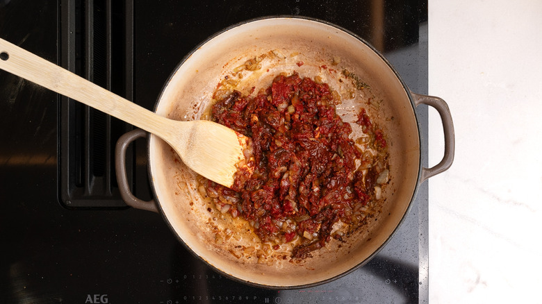 Pan frying tomato and seasonings