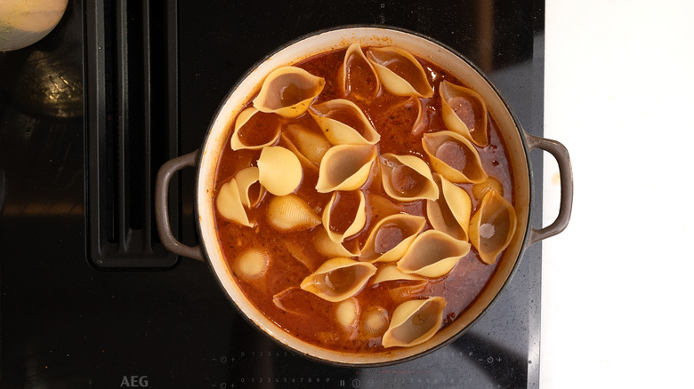 shell pasta in chicken broth
