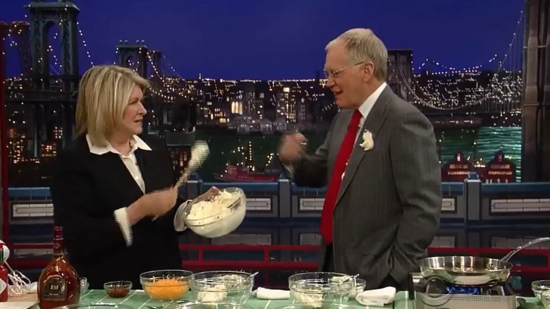Martha Stewart flinging food onto David Letterman