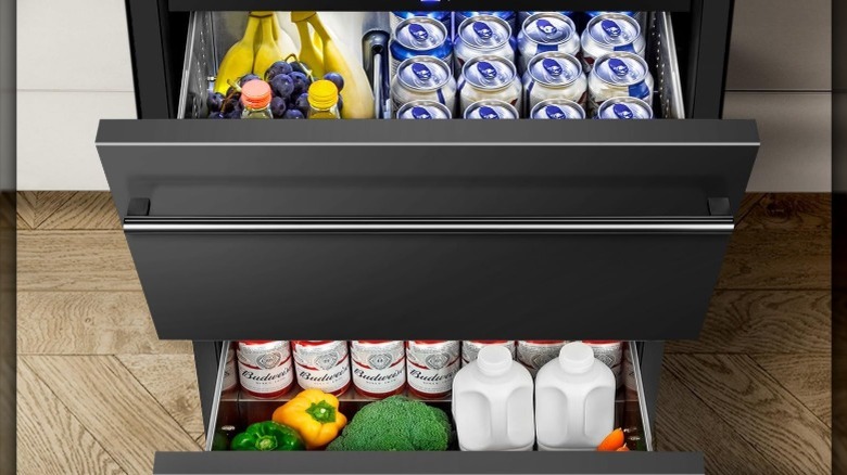 Open drawer fridge with black design and two tiers