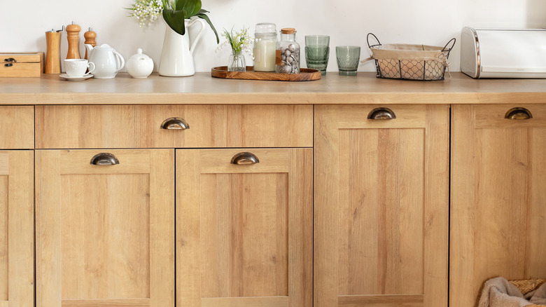 Unfinished poplar wood cabinets installed in a modern kitchen