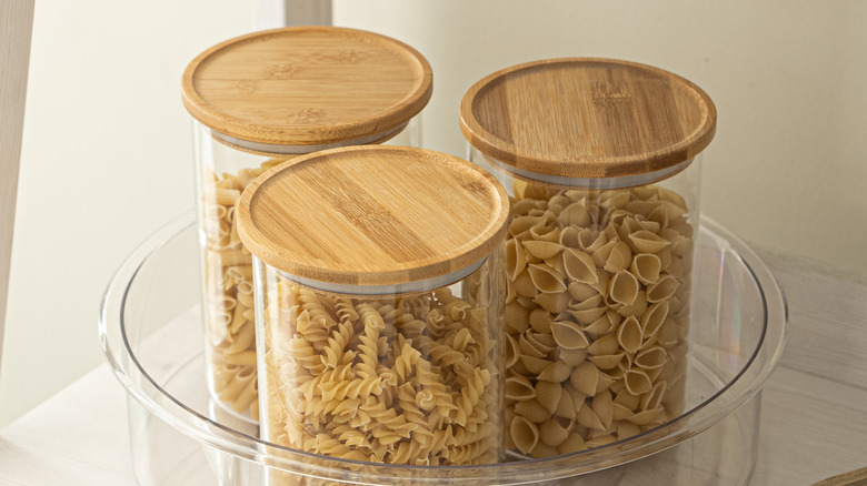Bamboo-topped jars in lazy Susan