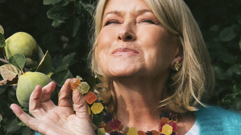 Martha Stewart posing with a gummy necklace