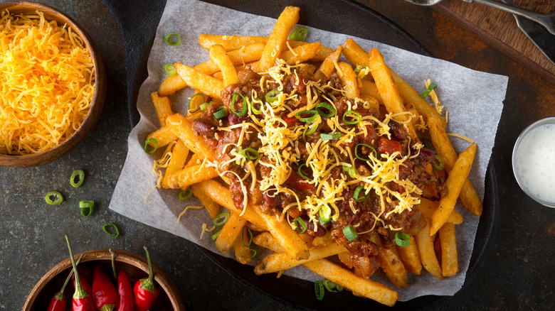 chili cheese fries with shredded cheese