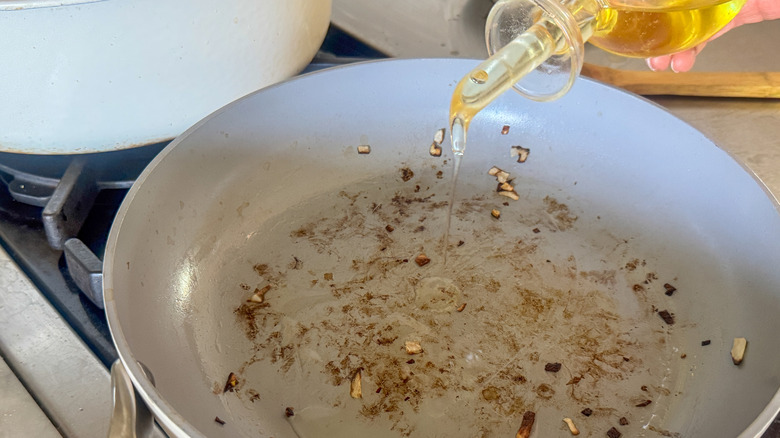 adding more oil to pan