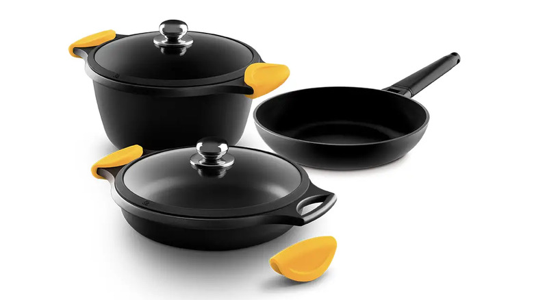 Three Castey cast iron pots and pans