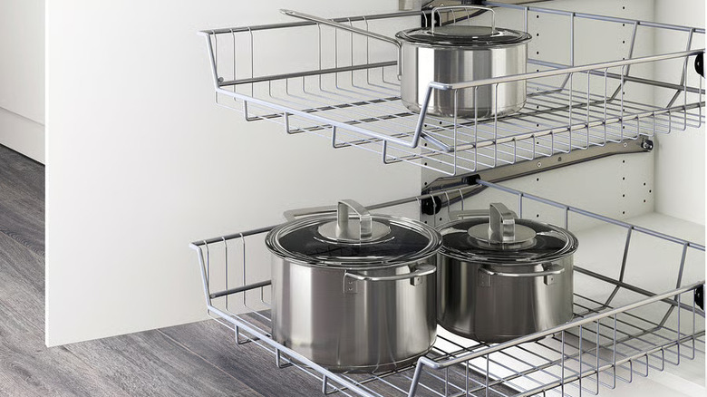 A cabinet with UTRUSTA wire shelves