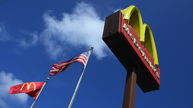 American flag outside of a McDonald's