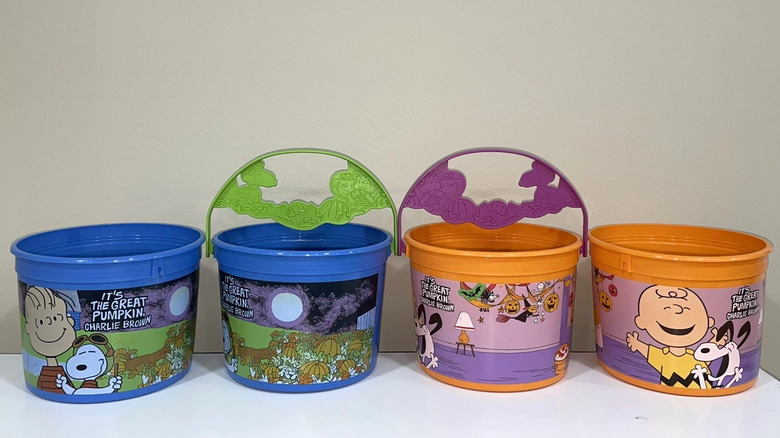 Four McDonald's Peanuts Boo Buckets on white table