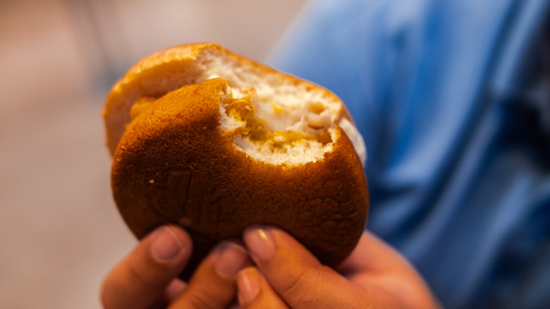 Filet-O-Fish pictured from the bottom, with a bite taken out of it