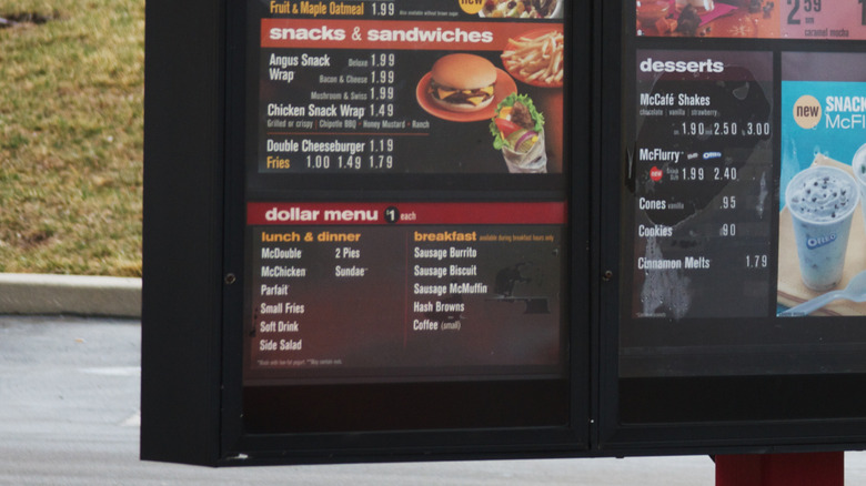 McDonald's drive-thru menu board with old Dollar Menu pricing from 2011