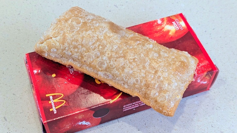 fried apple pie from McDonald's sitting on container