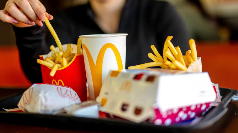 McDonald's meal with sandwiches drinks and fries
