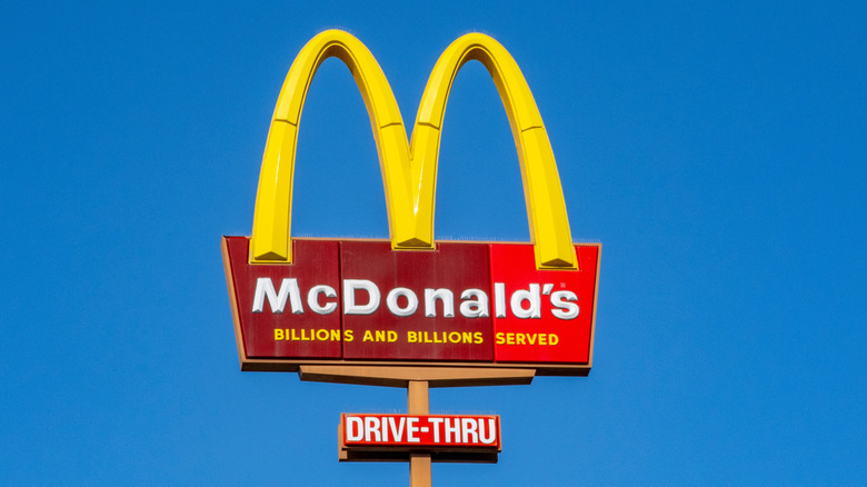 McDonald's sign against a clear, blue sky
