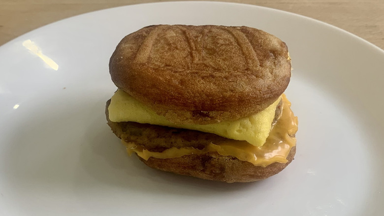 Sausage McGriddle on white plate with wood background