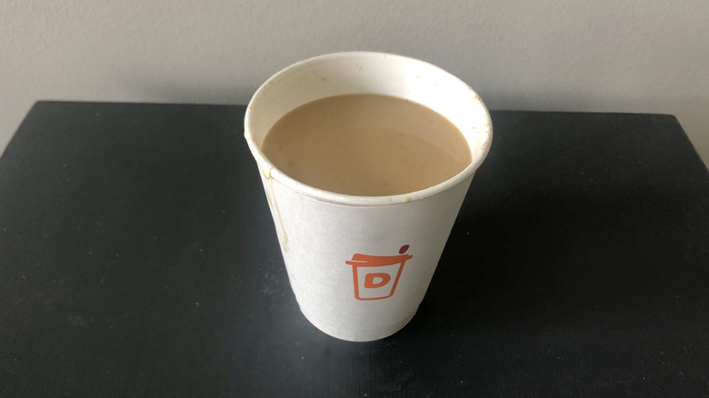 Dunkin' Donuts hot pumpkin spice latte in paper cup