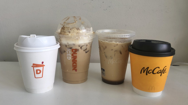Hot and iced pumpkin spice lattes from McDonald's and Dunkin'