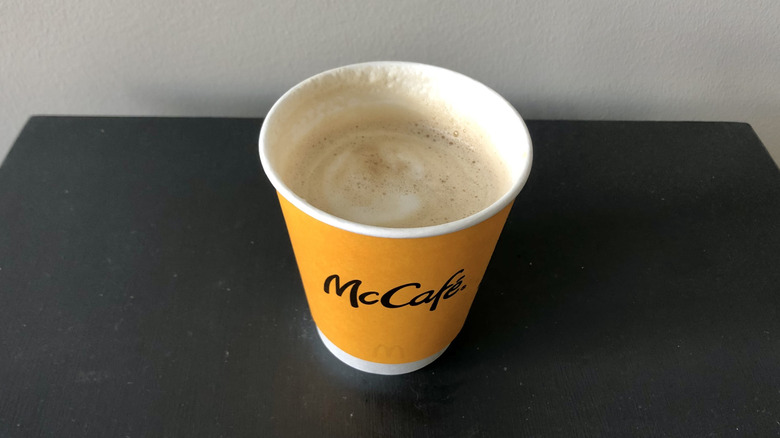 McDonald's hot pumpkin spice latte in a paper cup