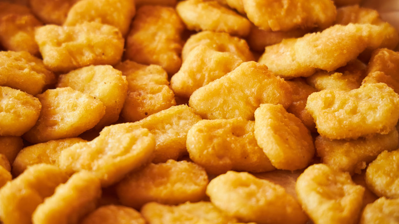 fast food chicken nuggets piled high