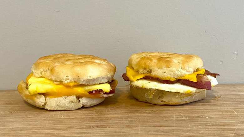 McDonald's Bacon, Egg and Cheese Biscuit next to Wendy's Bacon, Egg and Cheese Biscuit.