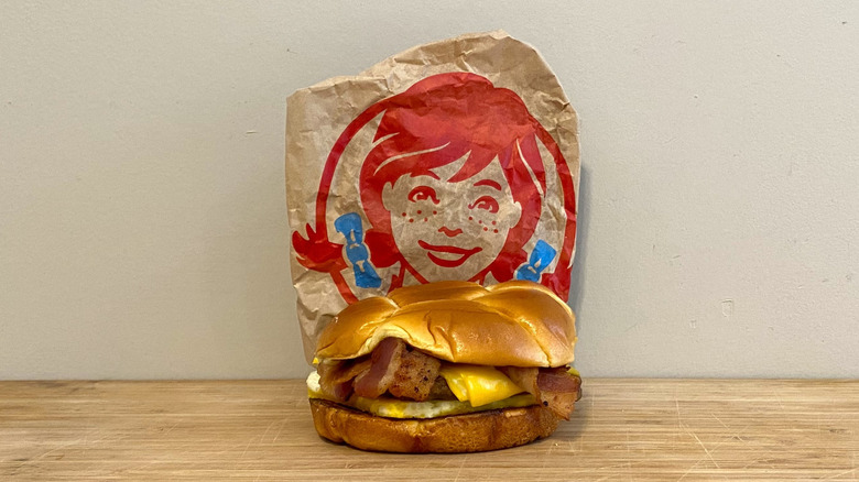 Breakfast Baconator in front of a Wendy's wrapper.