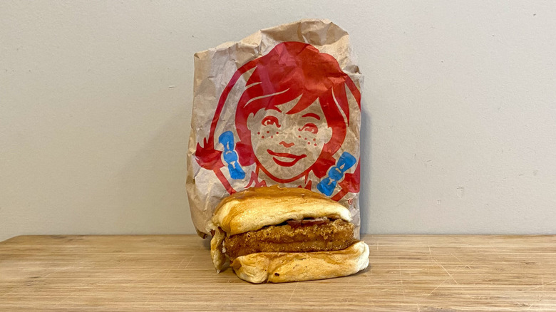 Maple Bacon Chicken Croissant in front of a Wendy's wrapper.