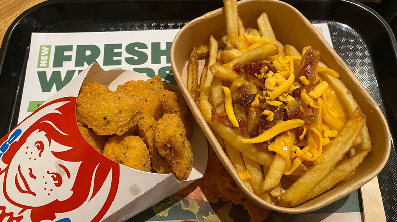 Wendy's chicken nuggets alongside chili fries