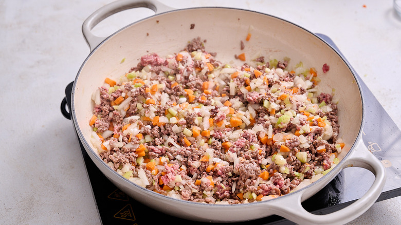 cooking vegetables in a skillet