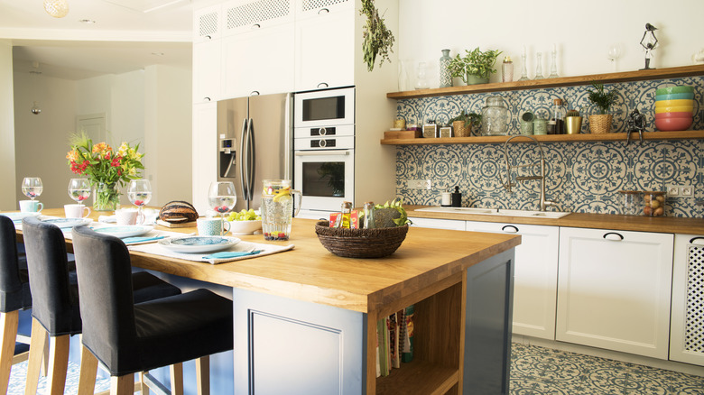 Kitchen and dining room interior in light colors