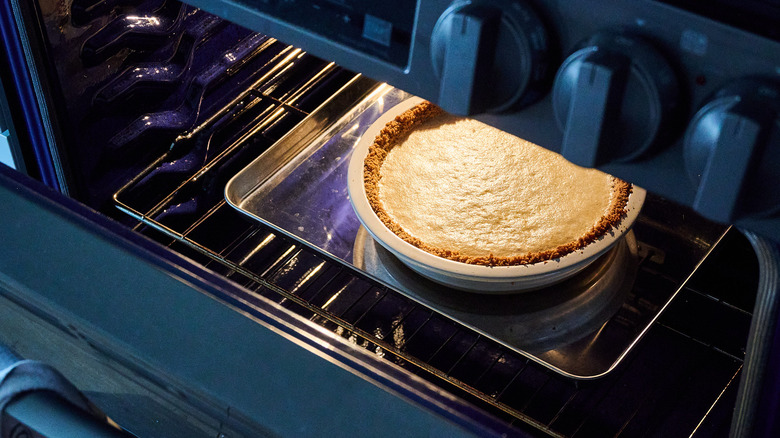 cooling the pie in the oven