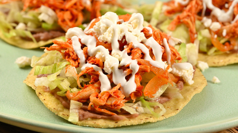 tinga topped with crema