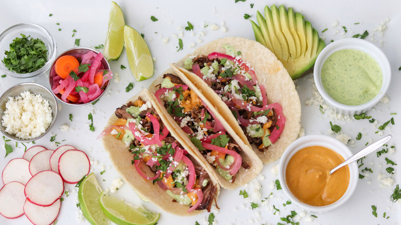 tacos served with Mexican crema