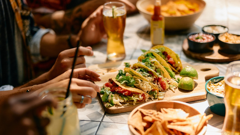 closeup of people dining at a Mexican restaurant