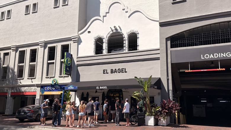 People outside of El Bagel in Miami's Coconut Grove neighborhood